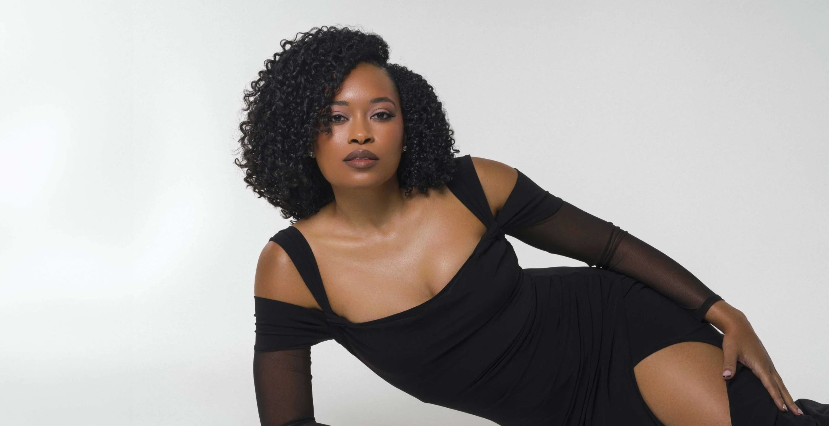 Natural curly hair transformation results from Jande Hair deep conditioning mask treatment